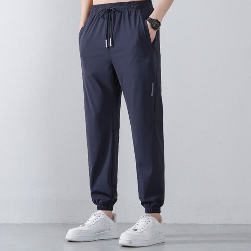 Pantalon de sport léger pour hommes avec poches zippées