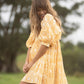 Robe courte d'été tunique florale à col en V et demi-manches